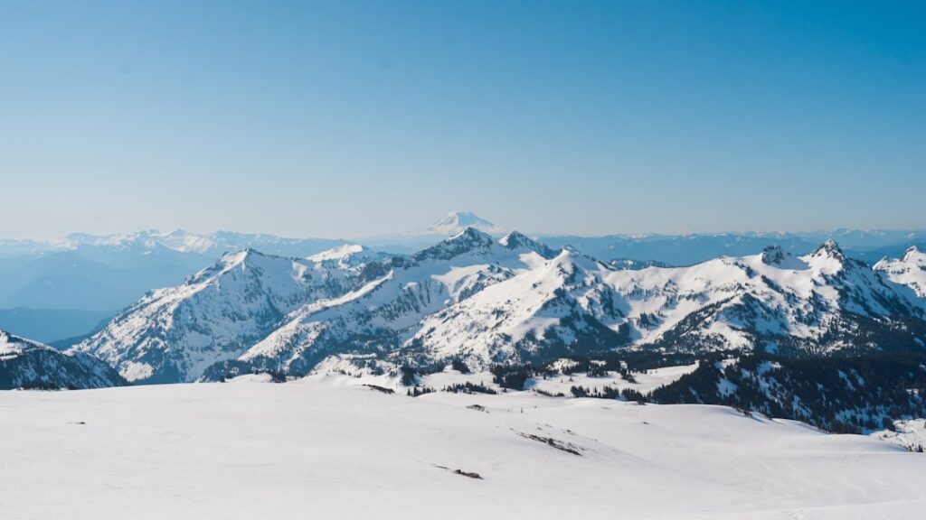 Mountain trail at high altitude with snow peaks