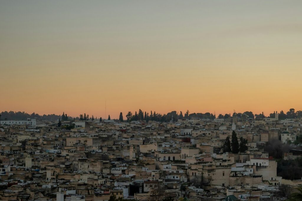 Sunset over medina rooftops in Morocco for Traveler's Diarrhea travel health guide