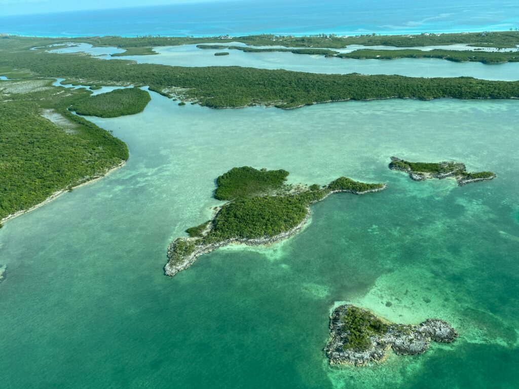 Bahamas turquoise water aerial view for traveler’s diarrhea in Bahamas guide