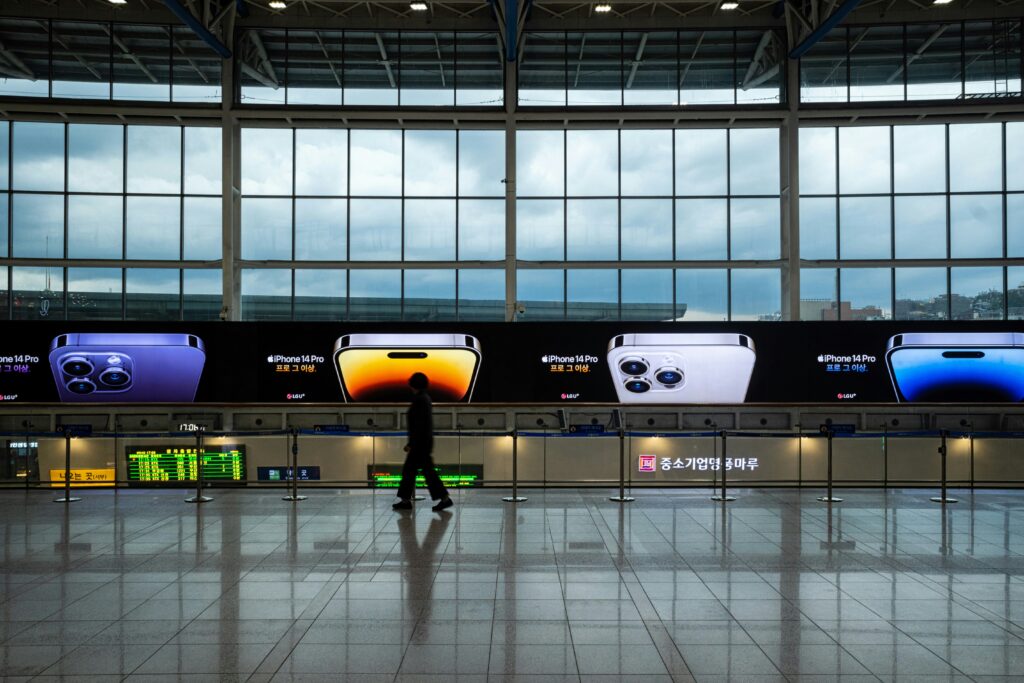 Business traveler walking through an airport terminal