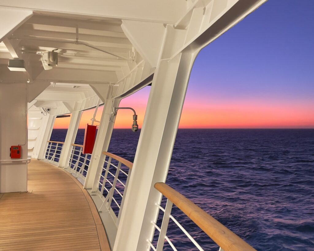 Cruise ship deck at sunset for cruise season GI outbreak readiness