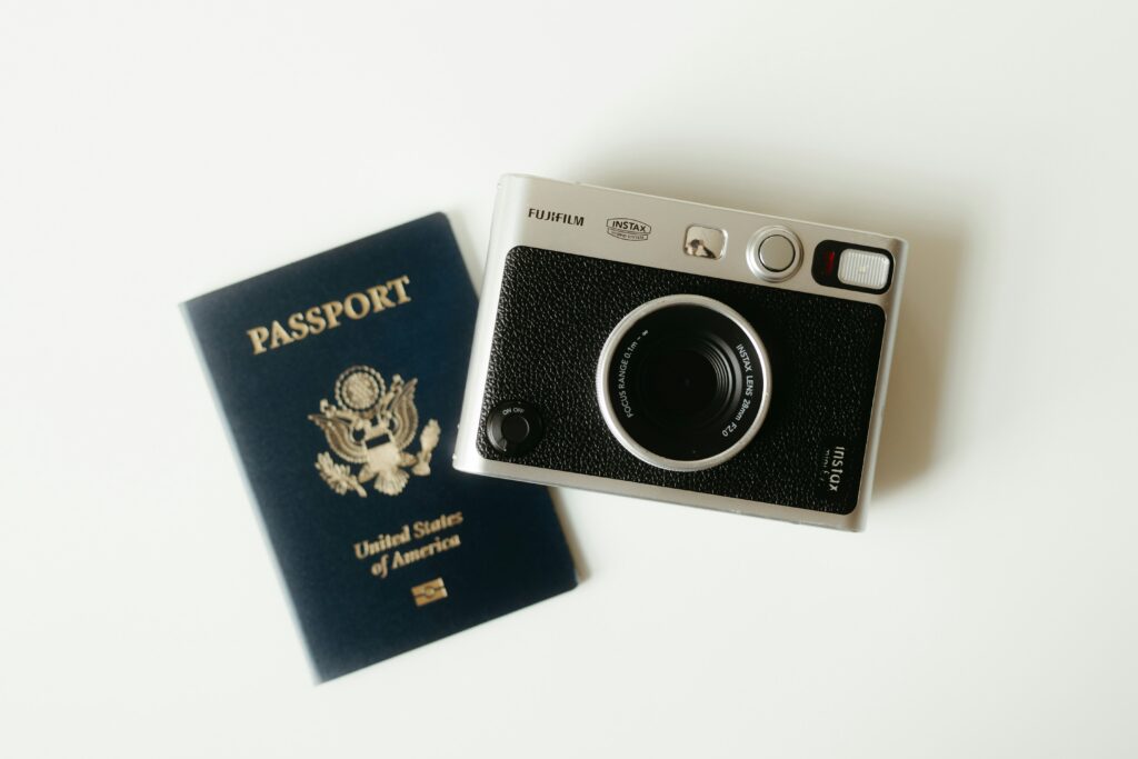 Flat lay of travel essentials and passport