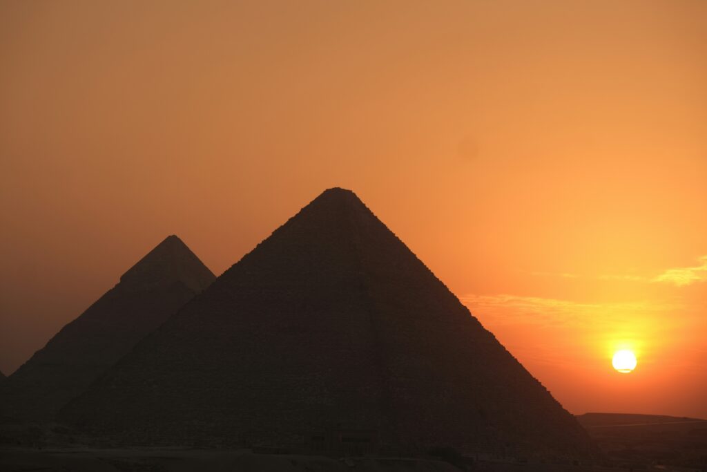 Egypt pyramids at sunset for Egypt travel clinic guide hero image