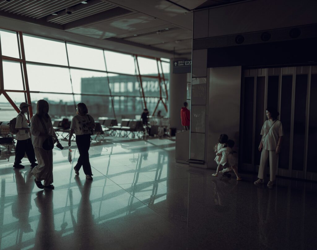 Family walking through an airport