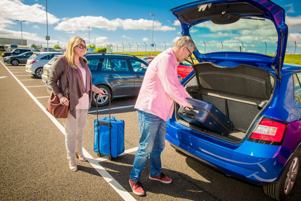 Family airport travel planning scene for a family travel health kit article
