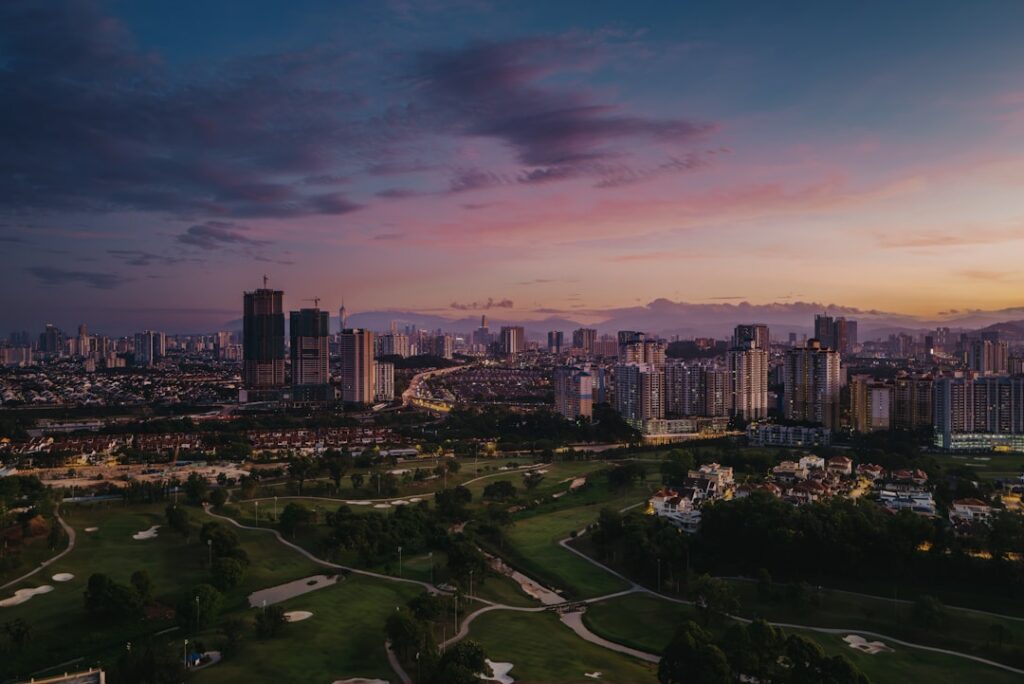 Malaysia travel clinic guide featured image showing Kuala Lumpur skyline