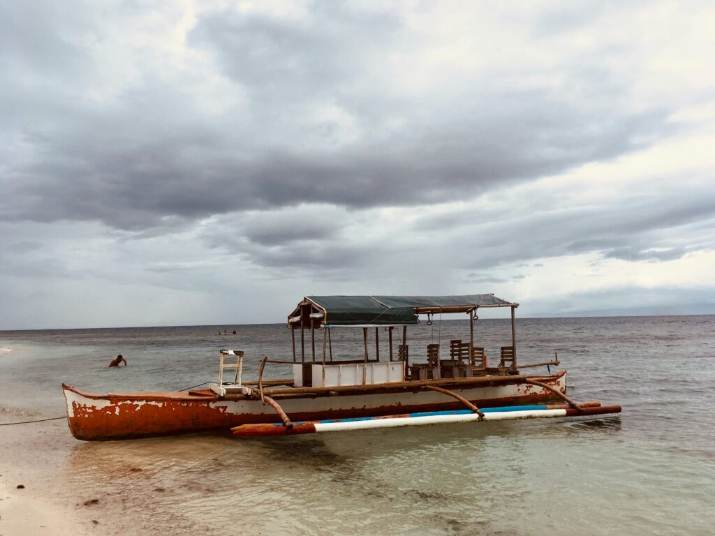 Dock and boat scene over water in the Philippines