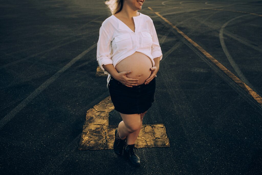 Pregnant traveler preparing for an international trip