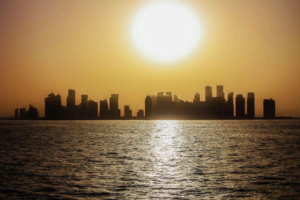 Qatar travel clinic guide featured image showing Doha skyline