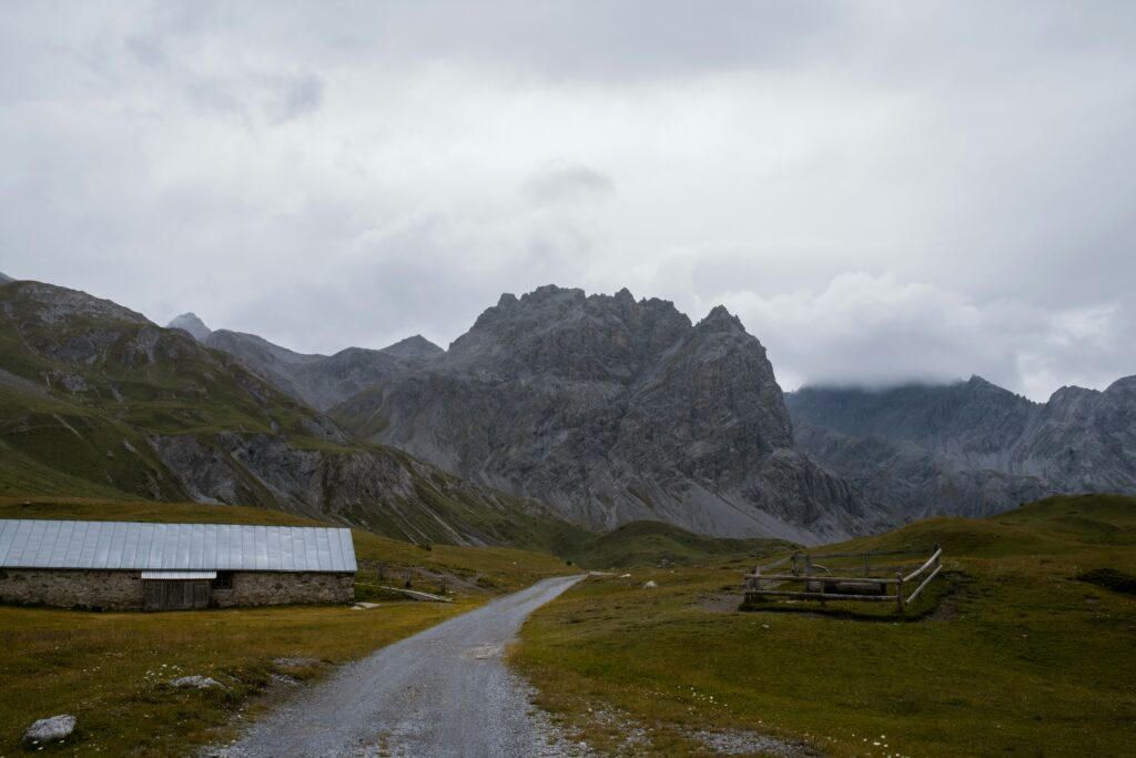 Remote mountain road landscape for medical evacuation insurance for remote trips