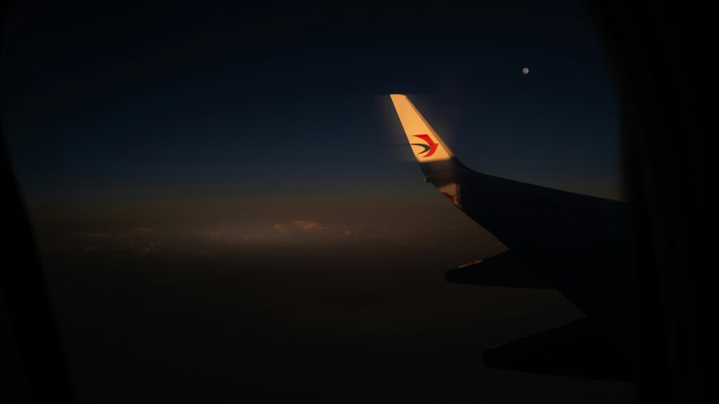 Airplane window view during a night flight
