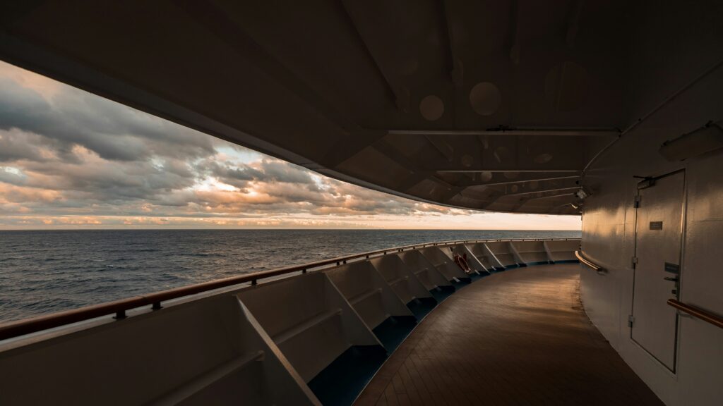Cruise deck ocean sunrise for a cruise health packing list